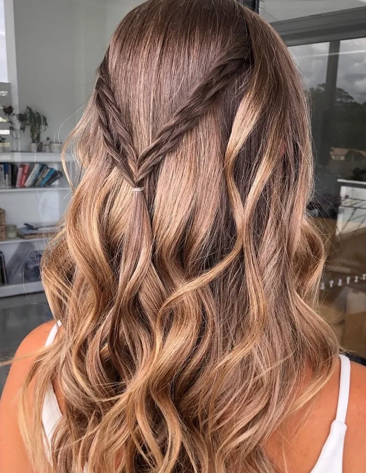 simple waves and braids wedding guest hairstyle