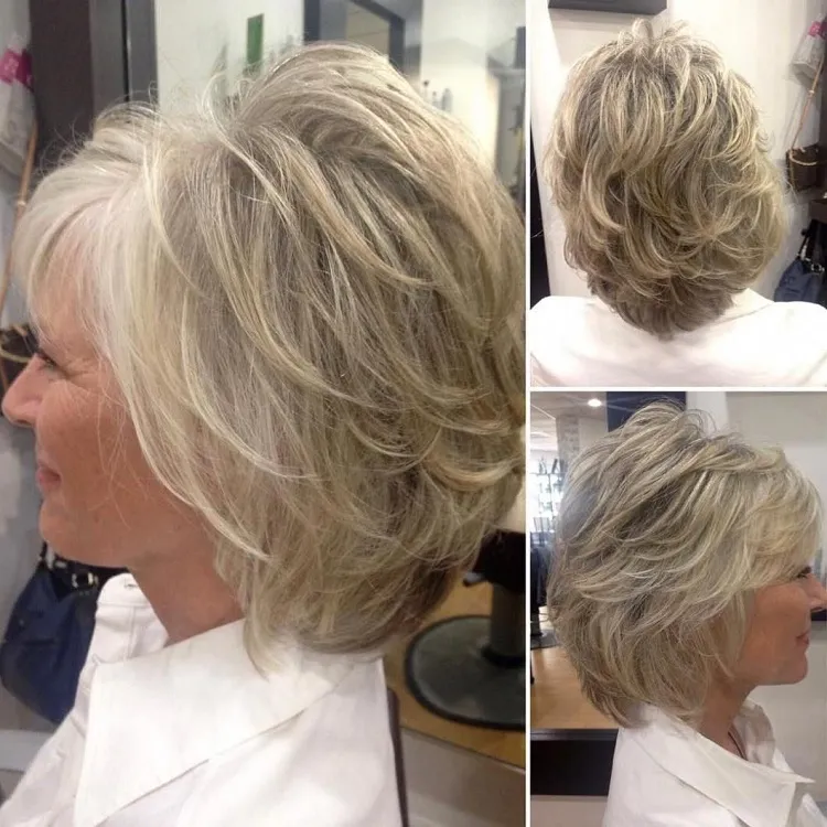 stacked bob haircut with wispy bangs and layers for women over 60