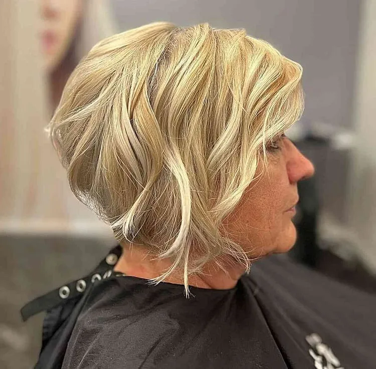 stacked layered blonde bob for women over 50 layered bob haircuts