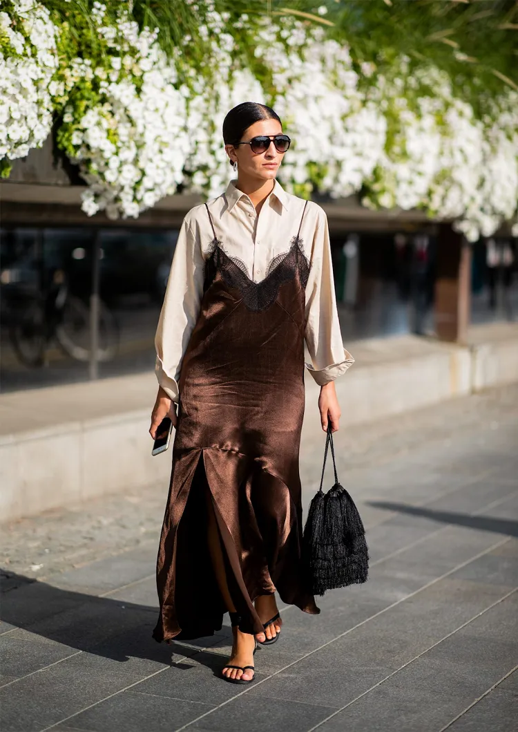 street style look summer 2023 long brown silk dress with satin shirt