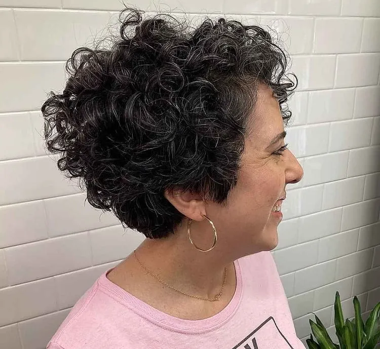tapered bixie for women over 60 with curly hair who suits a bixie cut