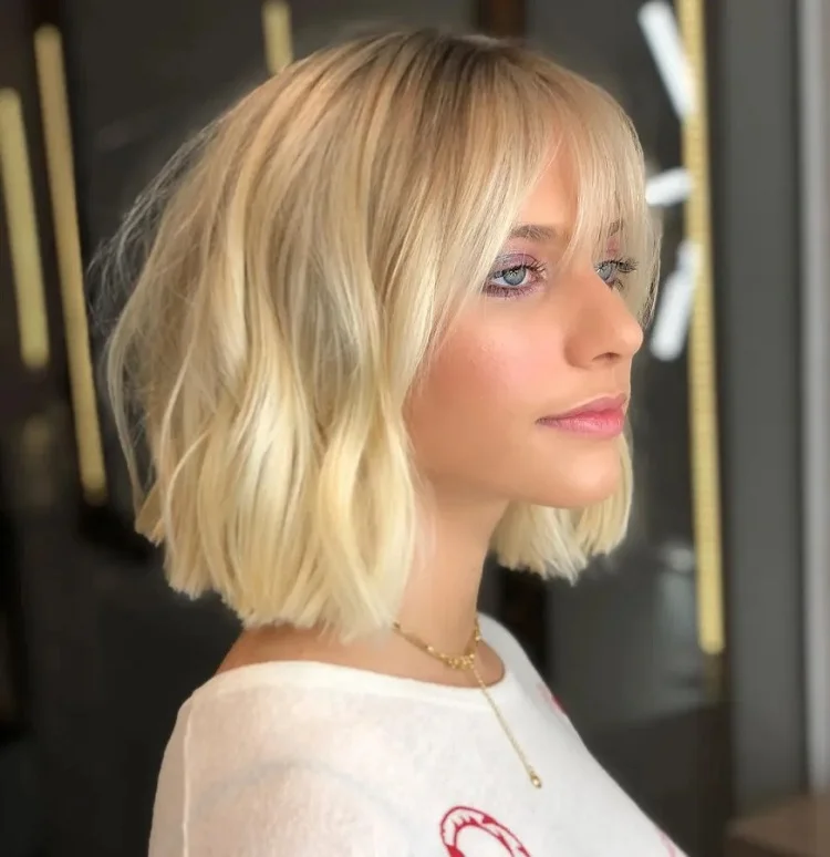 wavy blunt bob haircut with bangs for blonde hair