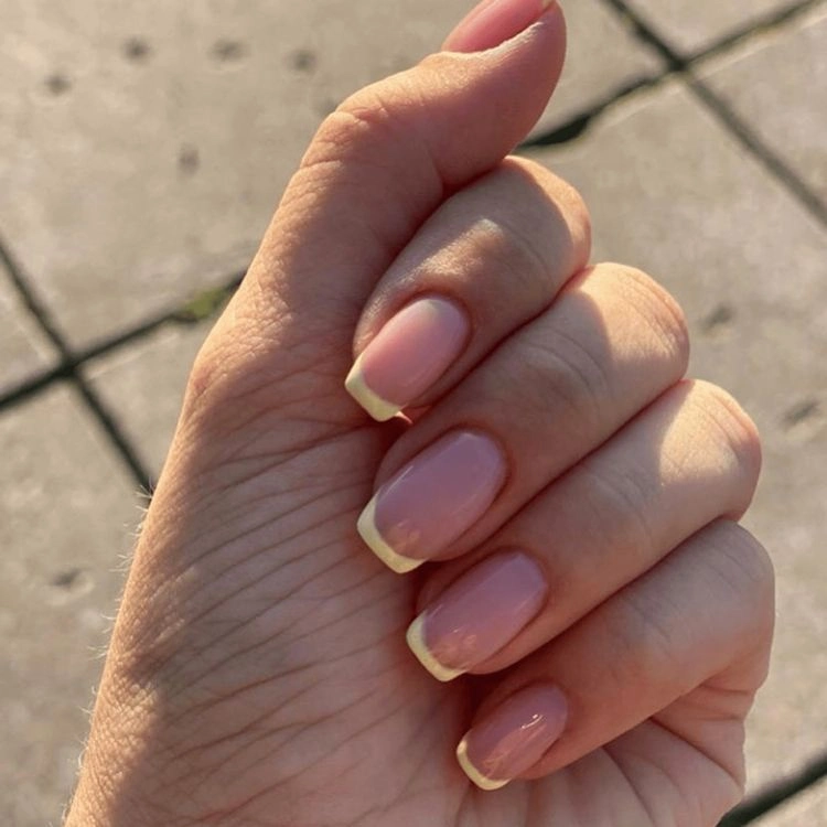french manicure with lemon yellow highlights