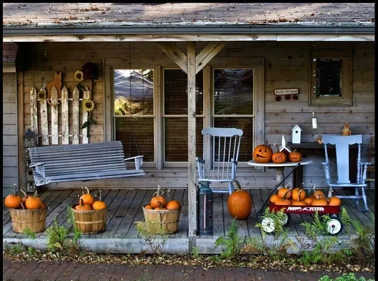 pumpkins and old chairs for porch fall design