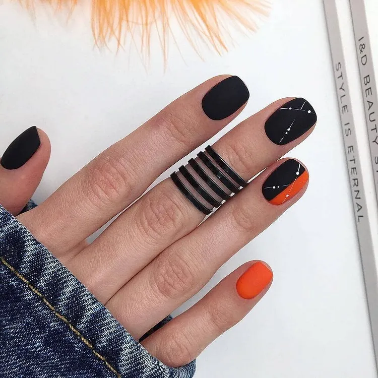 abstract black orange matte september short nails 2023