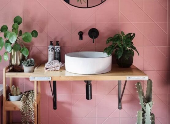 bathroom decor ideas 2023 pink tiles plants wooden storage shelves
