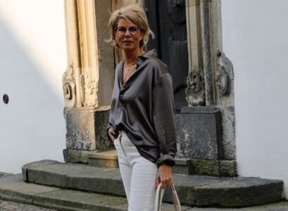 chic casual clothes women over 70 summer fall 2023 silk tuck in shirt straight white jeans sneakers handbag