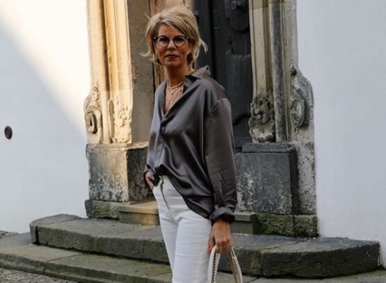 chic casual clothes women over 70 summer fall 2023 silk tuck in shirt straight white jeans sneakers handbag