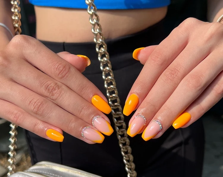 coffin summer nail designs 2023 orange french tips with rinestones