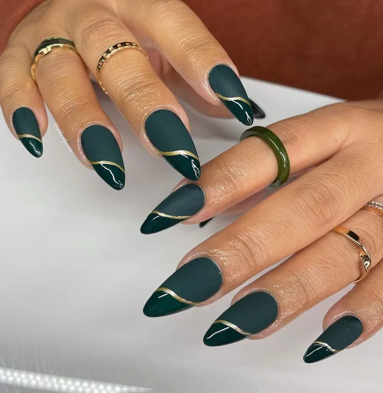 emerald green and gold french tip nails almond shape