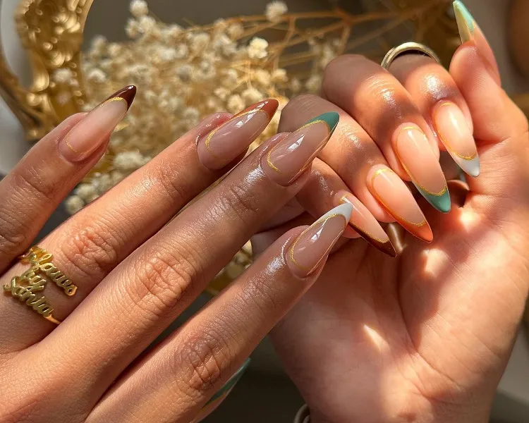 fall french tip nails 2023 with gold almond shape