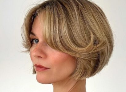 french girl bob with curtain bangs short haircut women 2023