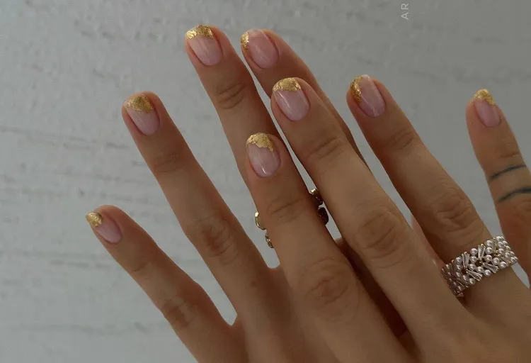 gold abstract french tip nails