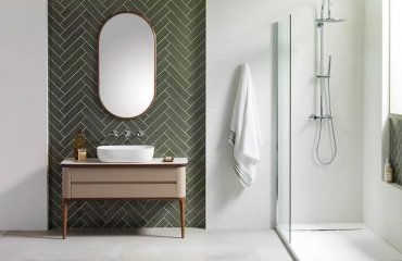 green herringbone subway tile pattern bathroom accent wall modern design ideas 2023