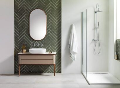 green herringbone subway tile pattern bathroom accent wall modern design ideas 2023