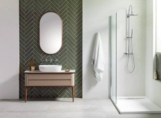 green herringbone subway tile pattern bathroom accent wall modern design ideas 2023