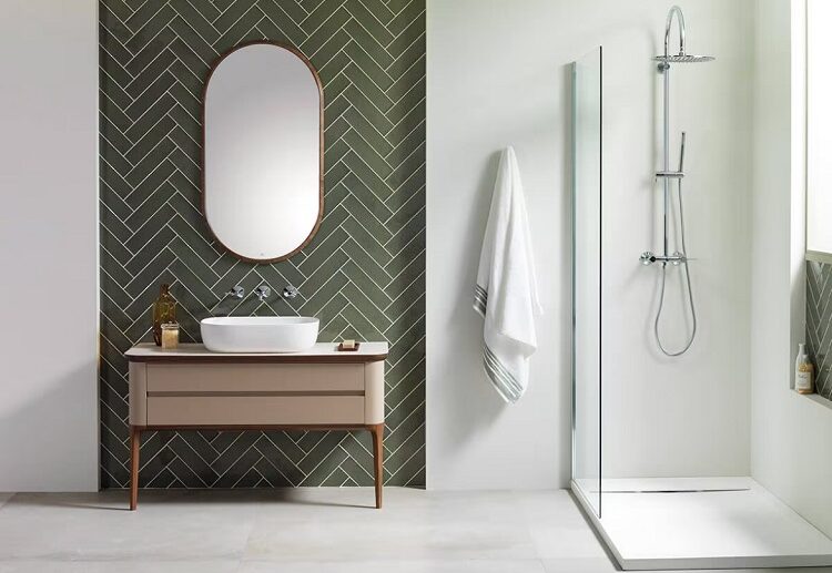 green herringbone subway tile pattern bathroom accent wall modern design ideas 2023