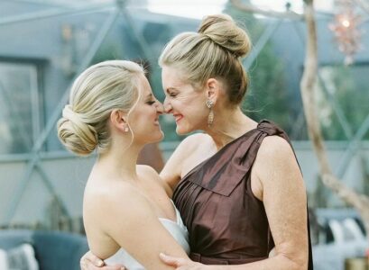 high bun mother of the bride chic hairstyles for women over 60