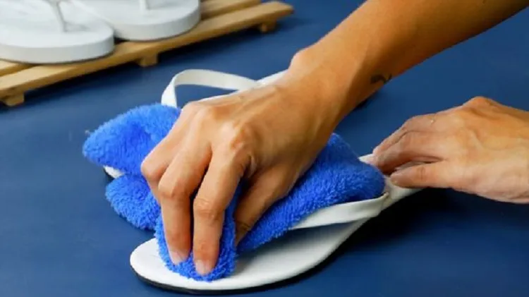 how to clean plastic flip flops rub with a cloth dipped in water detergent
