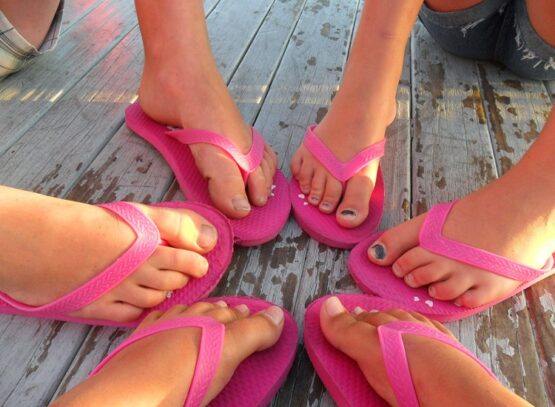 how to clean rubber flip flops rinse under running water