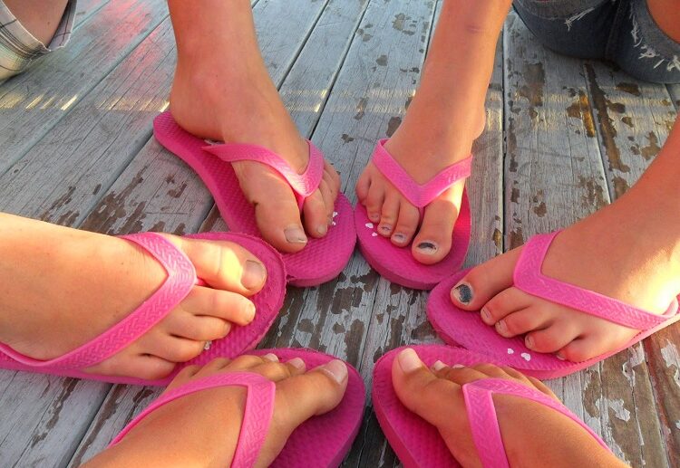 how to clean rubber flip flops rinse under running water