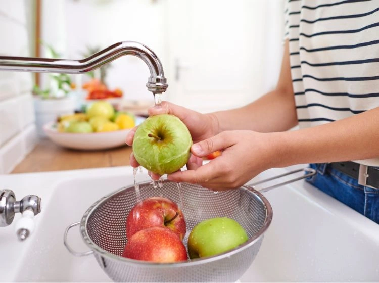 is it safe to eat fruit with pesticides how to wash them remove methods