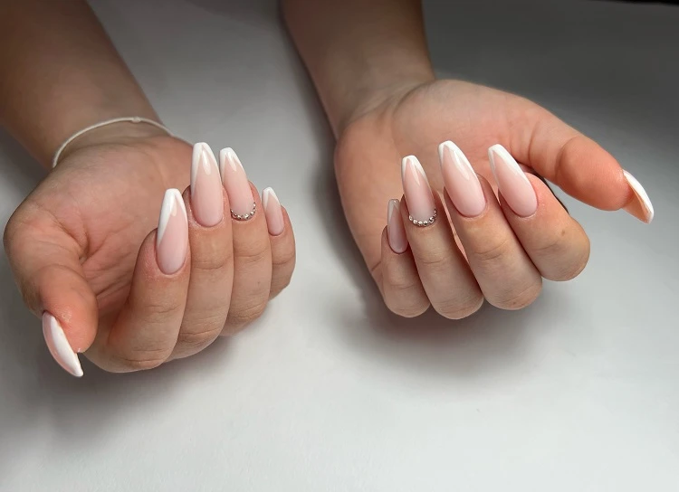 long coffin french tip nails with rhinestones