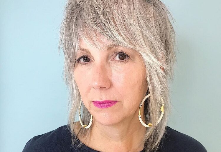 long shaggy bob for women over 50 with bangs 2023