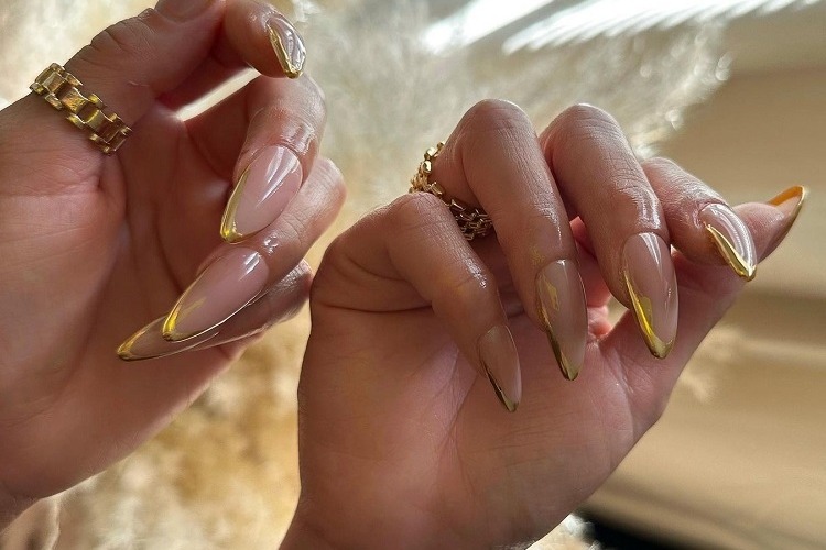 long stiletto gold french tip nails 2023