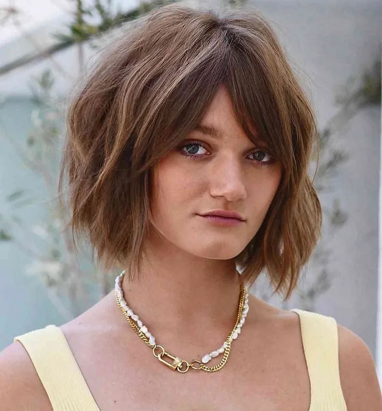 messy french bob haircut with curtain bangs blunt 2023