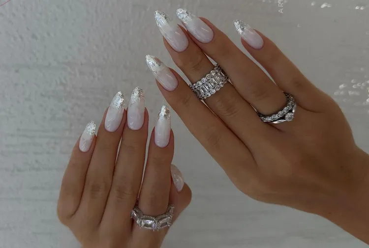 milky white nails with silver chrome french tips