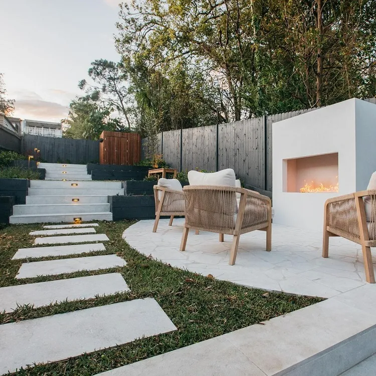 modern semi circle patio landscaping white concrete fire place comfortable lounge area