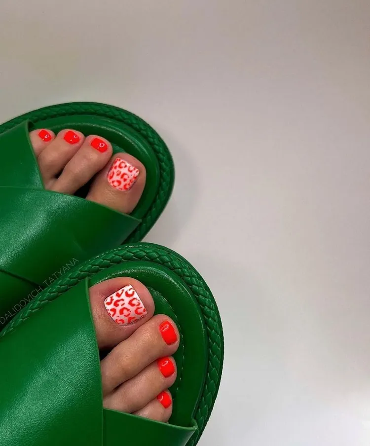 orange leopard print pedicure design idea summer 2023