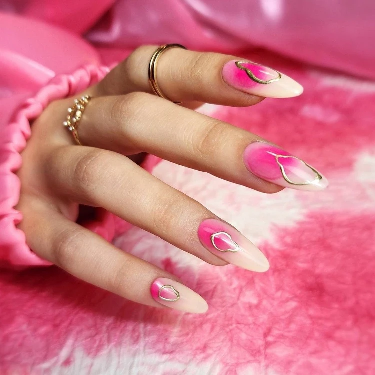 pink and white aura nails almond shaped with decoration