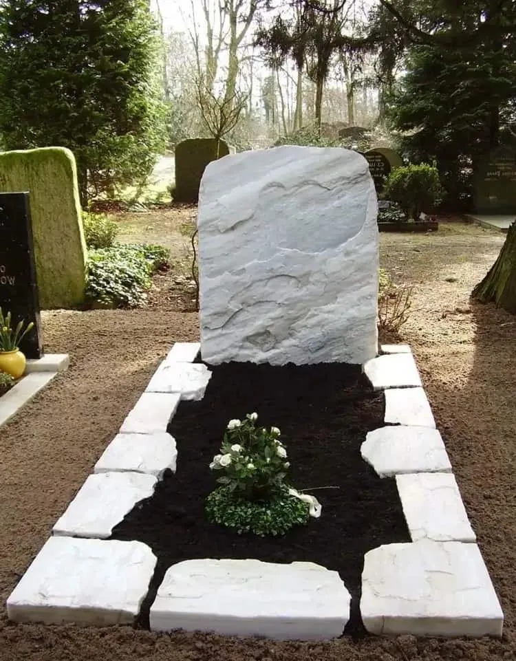 plain and elegant grave edging with white stones diy grave decoration ideas