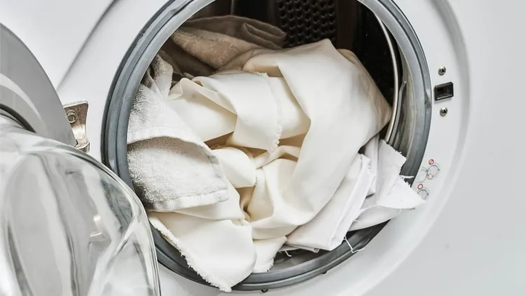 rinse aid can remove swat smell and stains from fabrics