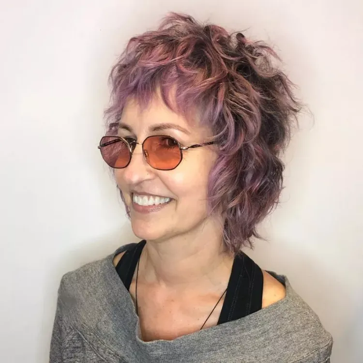 shaggy bob haircut with bangs for curly hair over 50 with glasses