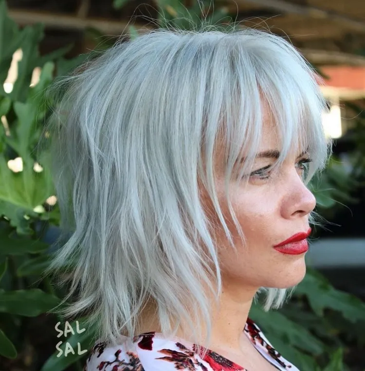 shaggy bob with wispy bangs for women over 50 grey hair