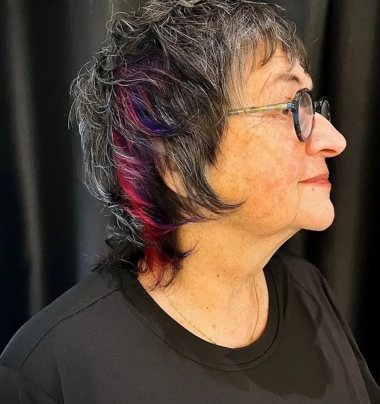 short salt and pepper wolf mullet with vibrant highlights wolf cut for women over 60