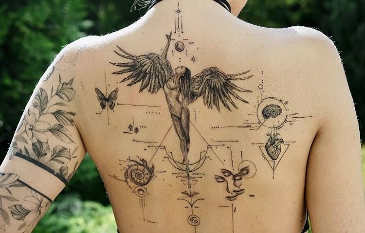 single needle female spine tattoo guardian angel modern abstract design idea