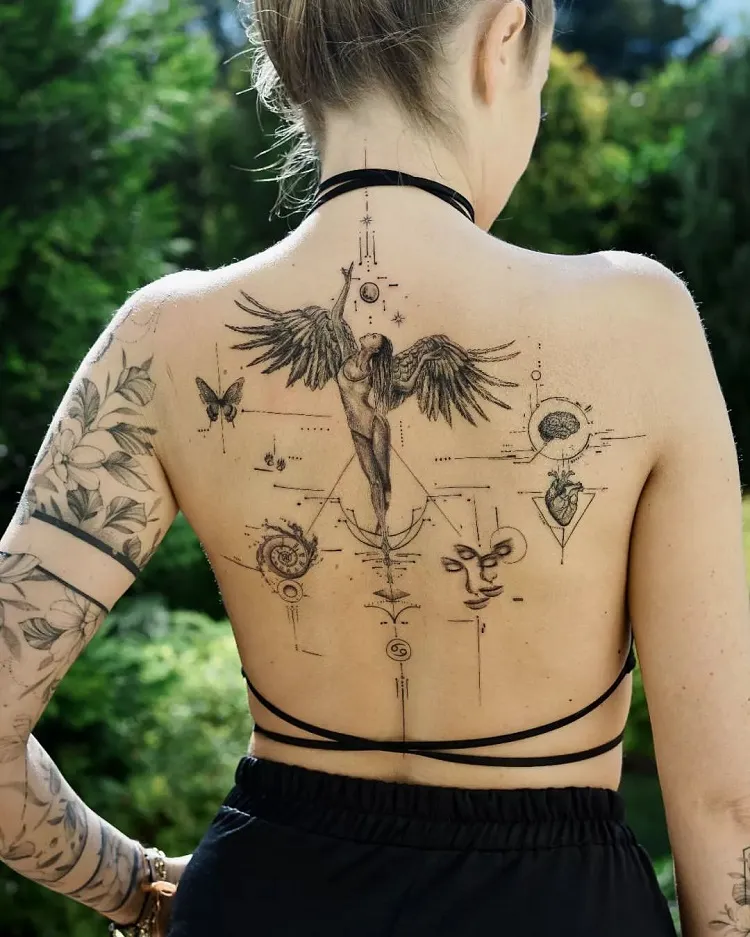 single needle female spine tattoo guardian angel modern abstract design idea