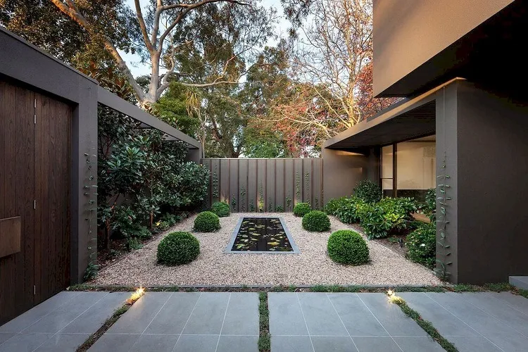 small garden pond modern landscape design ideas concrete slab pavement floor lights symmetrical ornamental bushes