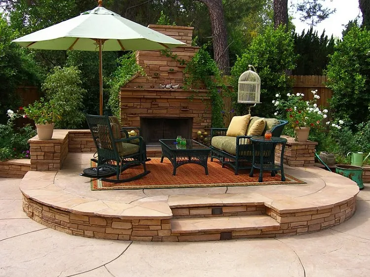 stone raised semi circle patio design idea lounge area fire place