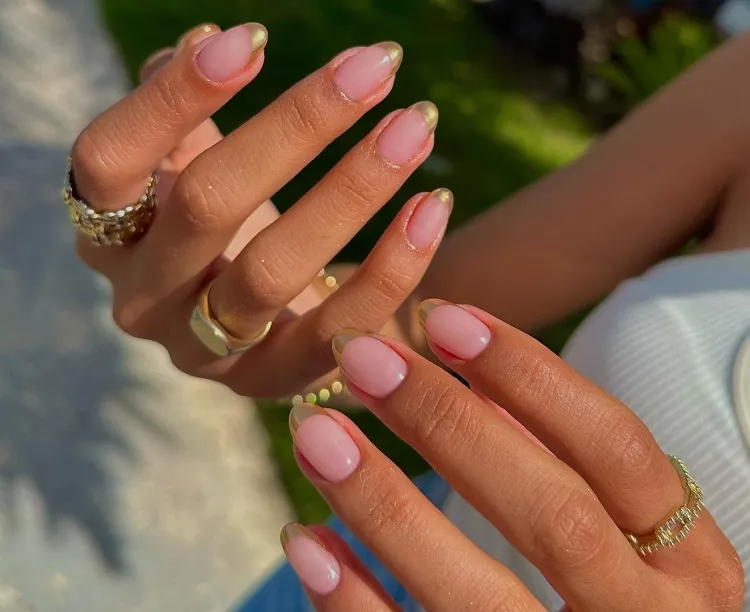 strawberry milk with gold french tip short almond nails