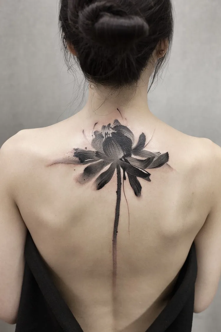 watercolor flower female spine tattoo design idea black and gray