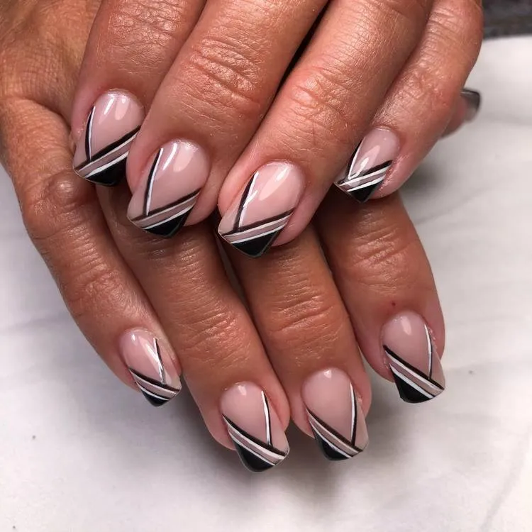 geometric french manicure with v tips