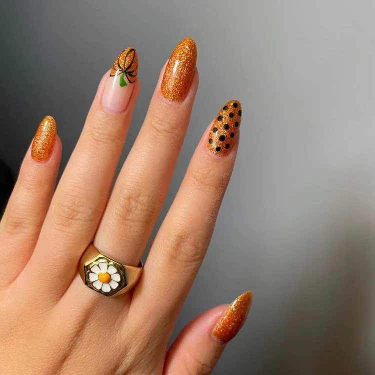 simple halloween nails pumpkin and polka dot themed nails