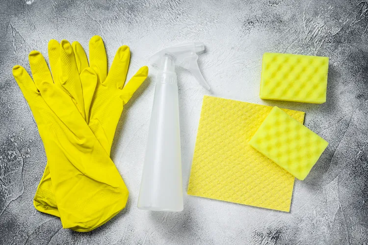 use appropriate protective equipment such as rubber gloves and cleaning tools in the toilet