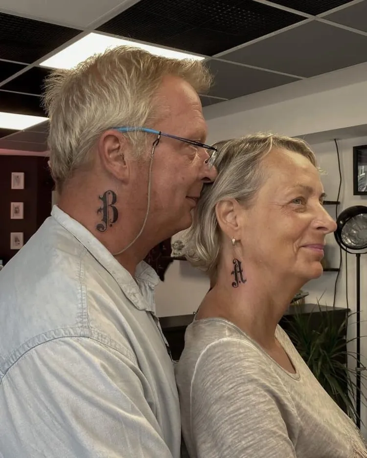 what tattoo for a 50 year old woman couple tattoo on the neck