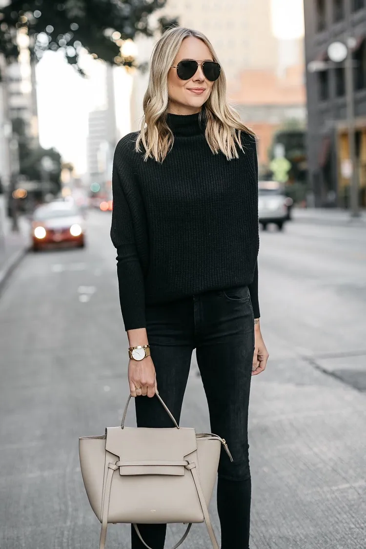 a black cashmere sweater is also a must with this style